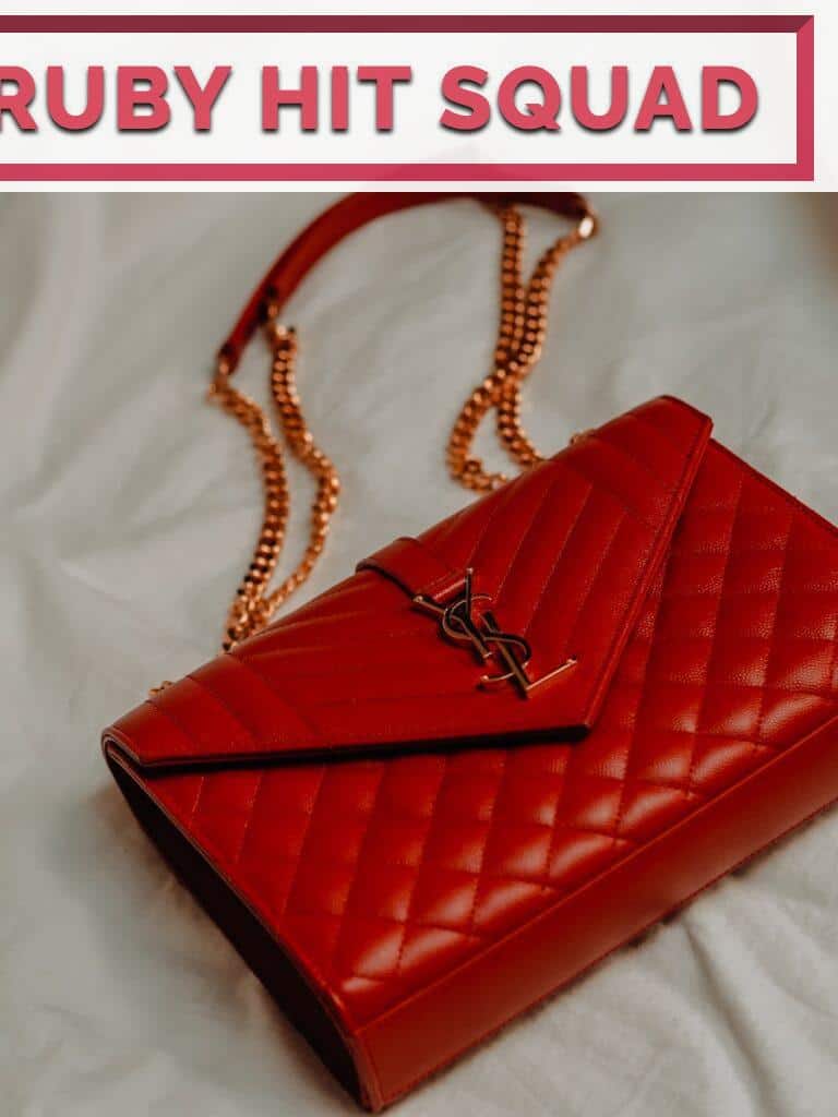 red leather flip case on white textile